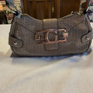 Guess small taupe purse. Never been used